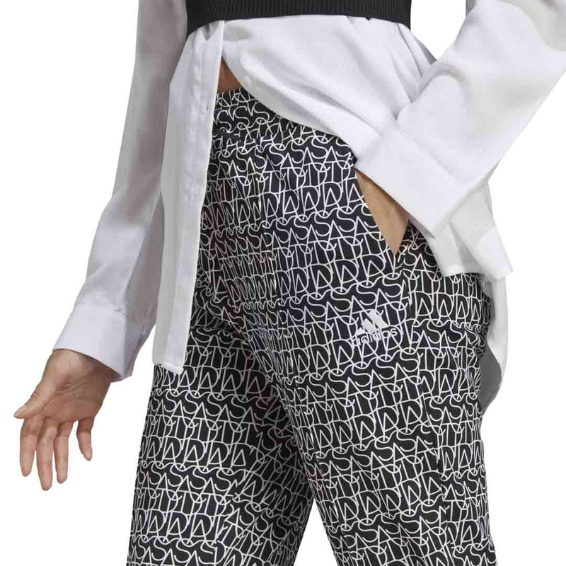 adidas - Pantalon évasé taille haute à imprimé graphique pour femme (IC5720)