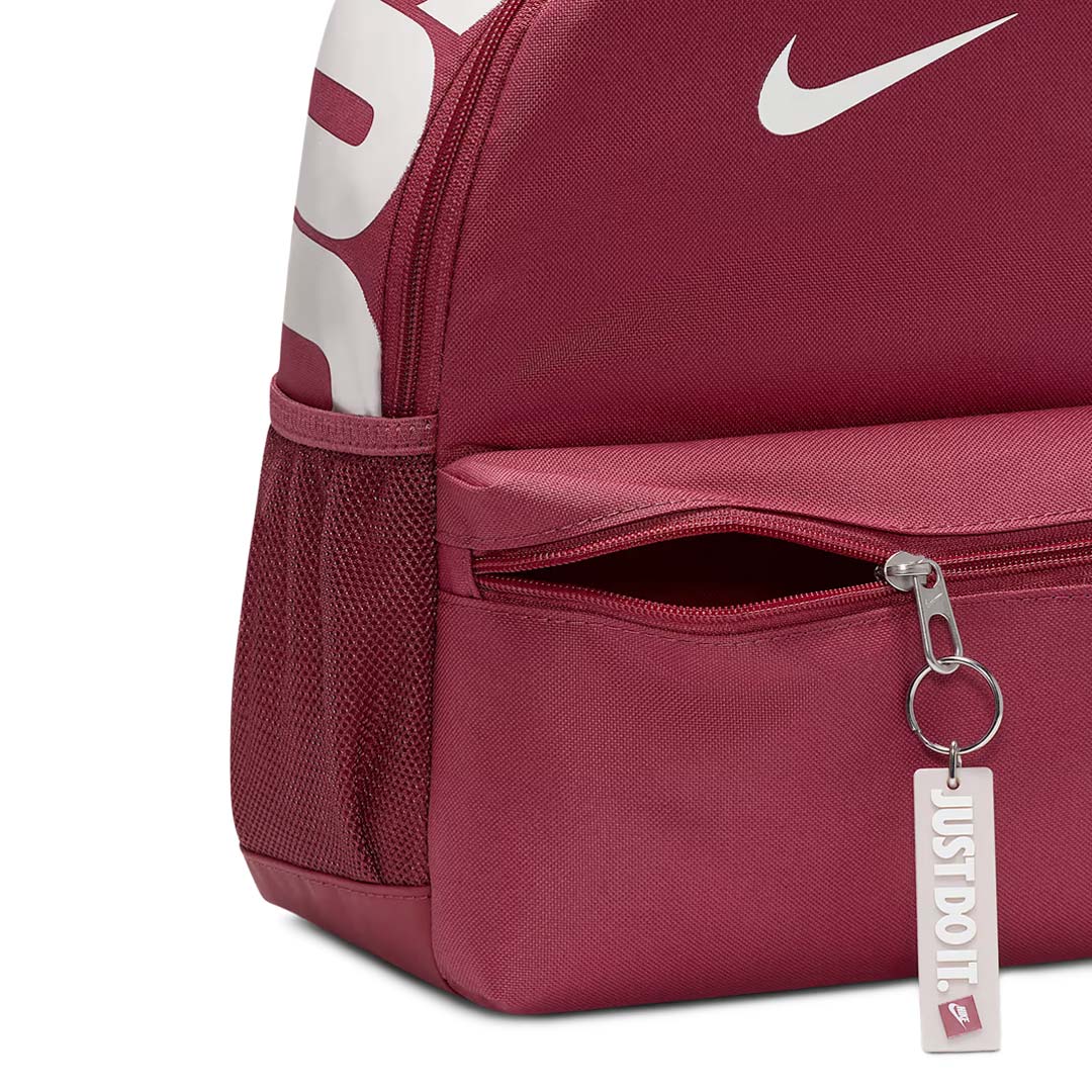 nike brasilia backpack burgundy Medium (University Red) side mesh pockets for water bottles and a zippered pocket on the inside to keep small items secure Nike - Kids' Brasilia JDI