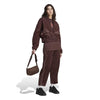 adidas - Pantalon en velours côtelé à ourlet ouvert pour femme (II8083) 