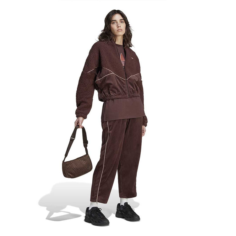 adidas - Pantalon en velours côtelé à ourlet ouvert pour femme (II8083) 