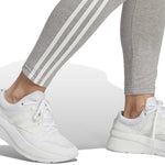 adidas - Legging Essentials 3 Stripes taille haute en jersey pour femme (IC7152)